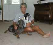 Gwen, blue Doboberman Cyrus, and her JRT Tyler